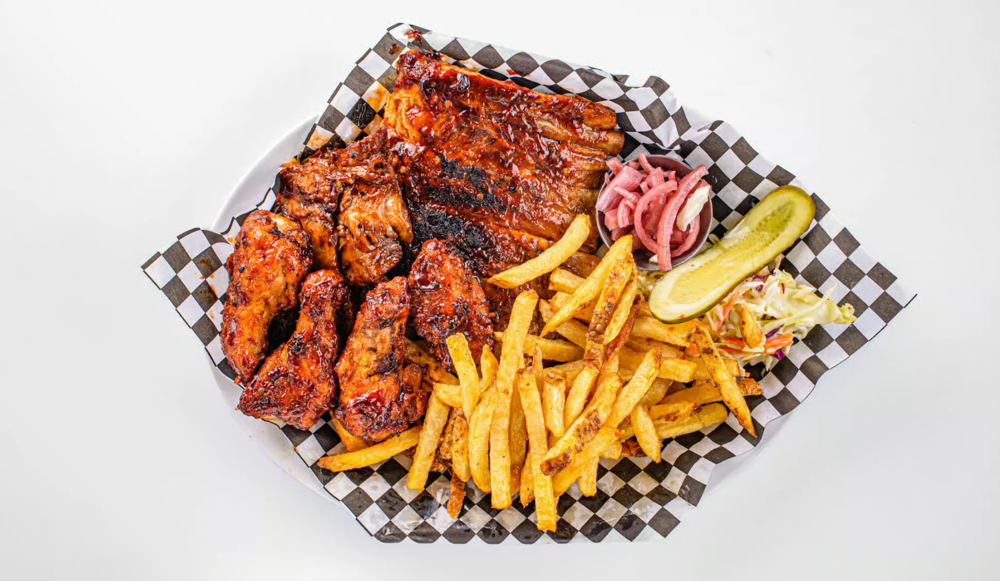 BBQ Smokehouse Platter at BEERTALES Calgary - Ribs, brisket and wings